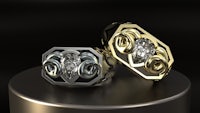 a gold and silver ring with a diamond in the middle